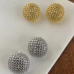 ear-piercing-jewelry-circle-hollow-ear-studs-2 gold earrings