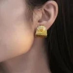 ear-piercing-jewelry-water-ripples-ear-studs-2 gold earrings