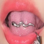 body-jeweller-snake-tongue-stud-1 Silver winding snake tongue stud piercing model shot