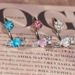body-jeweller-wing-piercing-rings-3 Sparkling diamond wing lip piercing rings with gems